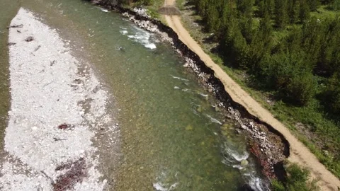 Dirt road eroded by river Stock Footage 312031201