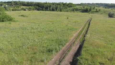 Dirt road in the grass Stock Footage 91116557
