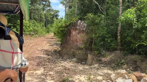 Dirt Road to Ta Prasith Stone Carving at Koh Rong Samloem in Cambodia Stock Footage 337090415