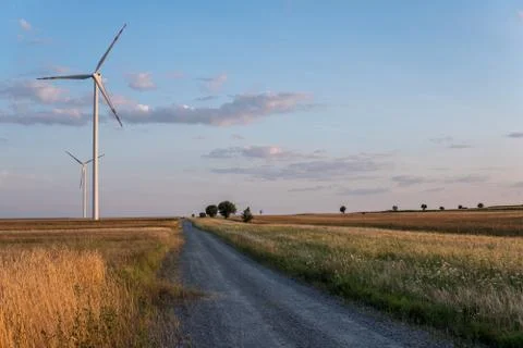 Dirt road through field Stock Photos