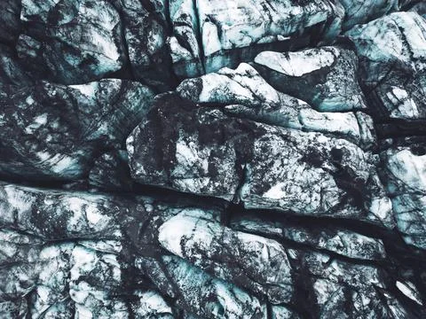 Dirt on the surface of the glacier Stock Photos
