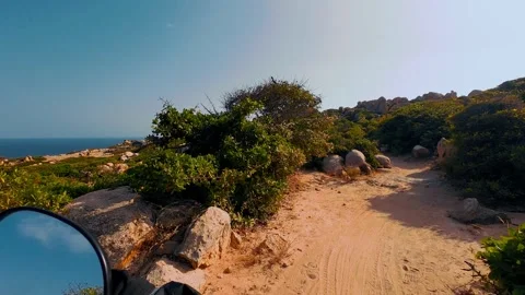 Dirt Trail Through Rocky Hillside Scrubland Under Bright Sun Stock-Footage 340463986