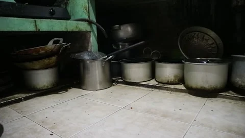 Dirty and messy kitchen with rustic utensils Stock Footage 340272459