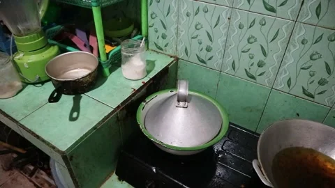Dirty and messy kitchen with rustic utensils Stock Footage 340272834