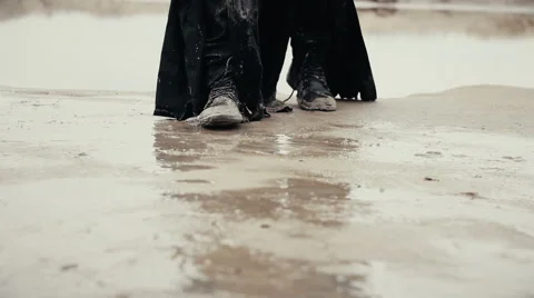 Dirty black boots, walking through the mud Stock Footage 67454343