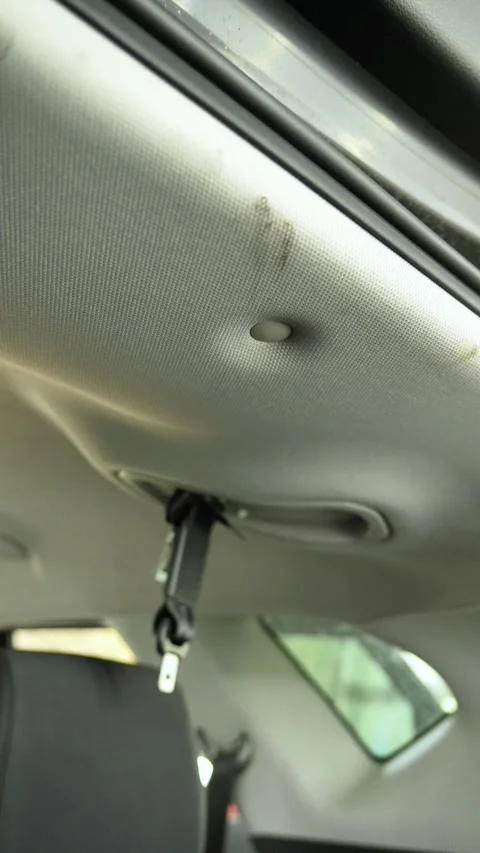 Dirty car ceiling before dry cleaning of the interior. detailing studio, car dry Stock Footage 328580985