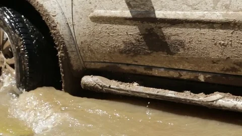 Dirty car crosses river Video stock 73004553
