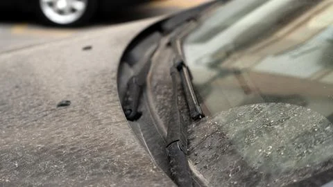 Dirty car windshield with wipers close up dusty surface texture 写真素材
