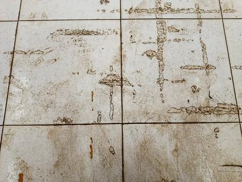 Dirty Ceramic Tile Floor Texture Stained Grunge Background with Scratches 스톡 사진