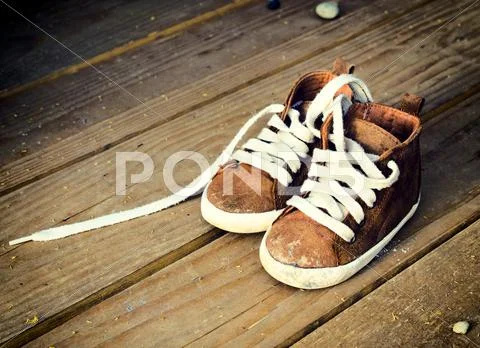 Dirty chidlren shoes Stock Photos