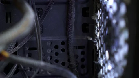 Dirty circuit board of the computer system dust dirt. The cooling fan is spi Stock Footage 153874943