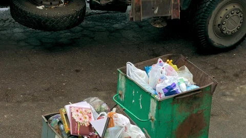 Dirty Claw of Robotic Arm of Side Loader Garbage Truck Takes Rusty Green Trash Stock Footage 105044546