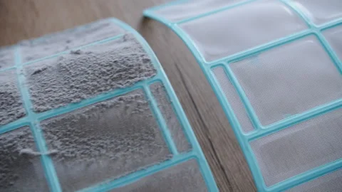 Dirty clogged air conditioner filter causing high energy consumption 動画素材 343959183