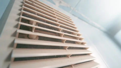 Dirty Clogged Ventilation Grille Covered with Dust and Cobwebs on Wall | CloseUp Stock Footage 333656380