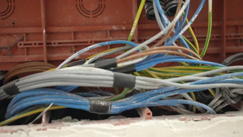 Dirty colourful electrical cables installed inside the junction box Stock Footage 211410799