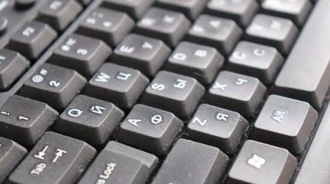 A dirty computer keyboard keys closeup Stock Photos