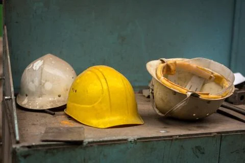 Dirty construction helmets Foto stock