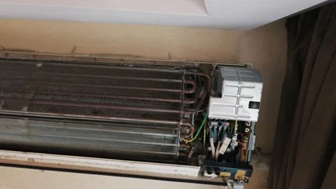 Dirty Disassembled Wall Air Conditioner Unit Covered in Mold and Dust Stock Footage 338104359
