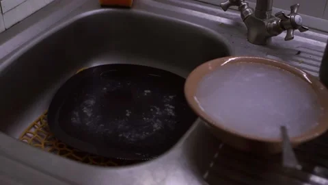 Dirty dishes. Dirty dishes in the kitchen. Dirty forks and spoons. Stock Footage 130727341