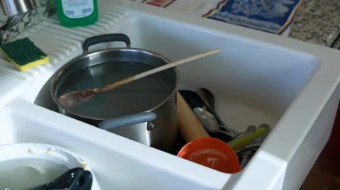 Dirty dishes in a kitchen sink Stock Footage 32906191