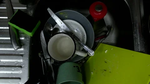 Dirty dishes in kitchen sink Stock Footage 227558296
