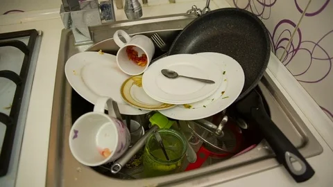 Dirty dishes in the sink Stock Footage 69917517
