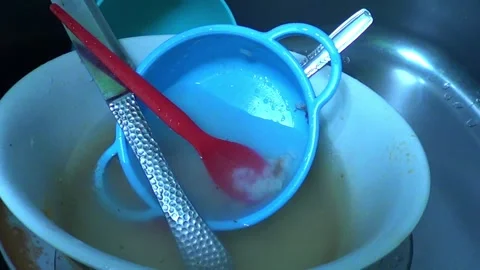 Dirty dishes in the sink Stock Footage 305653783