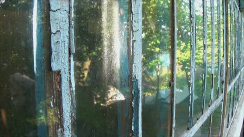 Dirty glass in old window frames. Very old cracked paint Stock Footage 169510577