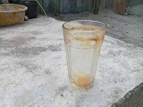 Dirty glass used for coffee Stock Photos