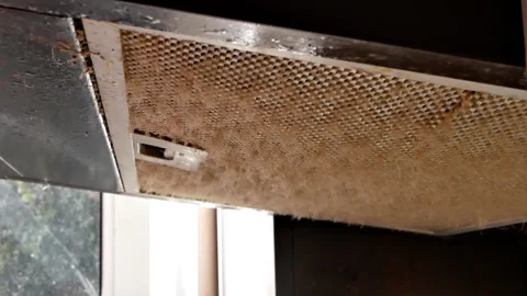 Dirty grates of the kitchen hood needs cleaning  Stock Footage 219634563
