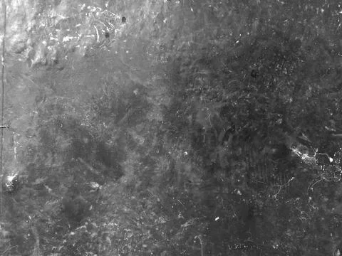 Dirty gray textured surface forming abstract background with rough pattern. Stock Photos