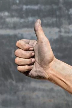 Dirty hand of a worker man Stock Photos