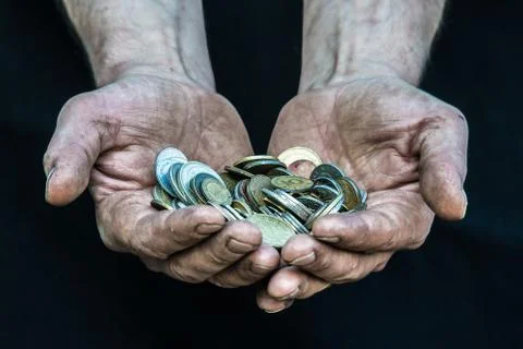 Dirty hands homeless poor man with many coins from different countries illust Stock Photos