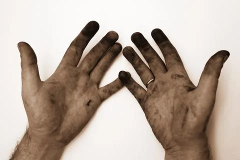 Dirty hands on a white. Stock Photos