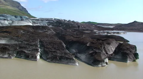 Dirty ice in terminal section of glacier, pan Stock Footage 37892480