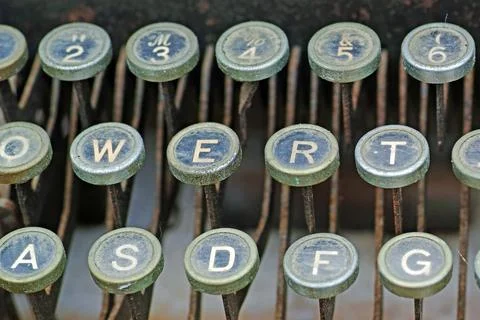 Dirty keys of a mechanical typewriter. Stock Photos
