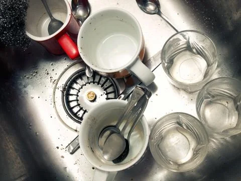 Dirty kitchen sink Stock Photos