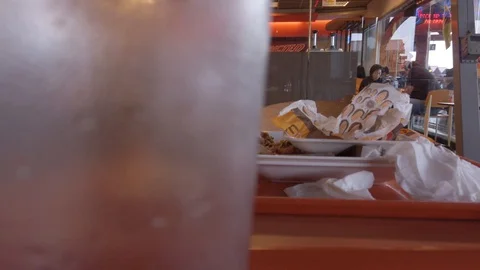 Dirty Leftover on The Table at AW Restaurant, Soekarno Hatta Airport Jakarta Stock Footage 129884765