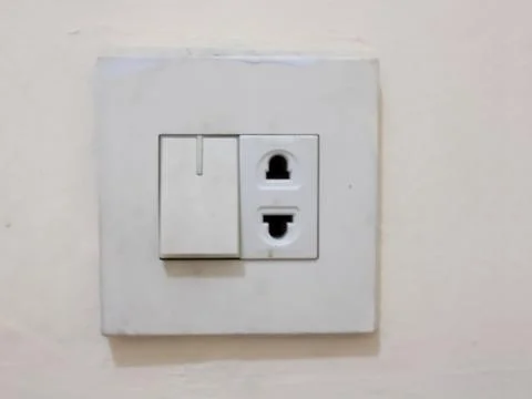 Dirty light switch Stock Photos