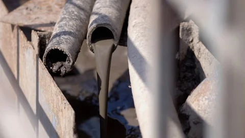 Dirty liquid poured from the chimney Stock Footage 71641216