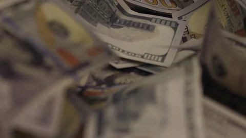 Dirty Money Hundred Dollar Bills in a Glass Case Stock Footage