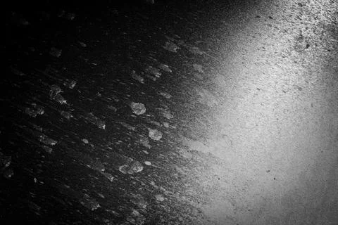 Dirty mud splashes make dynamic abstract trailing patterns as they dry on the Stock Photos