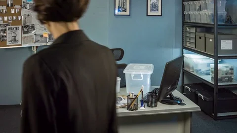 Dirty not honest cop steals cash out of the box the physical evidence in office Stock Footage 70519441