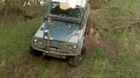 Dirty offroad car slides down the slope Stock Footage 58281055