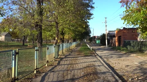 Dirty old empty street with bad road Stock Footage 143266878