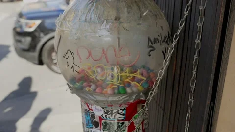Dirty old gum ball machine with graffiti Stock Footage 210368410