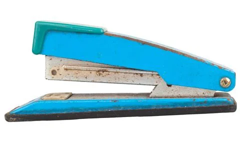Dirty old stapler on white background Stock Photos