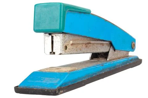 Dirty old stapler on white background Stock Photos