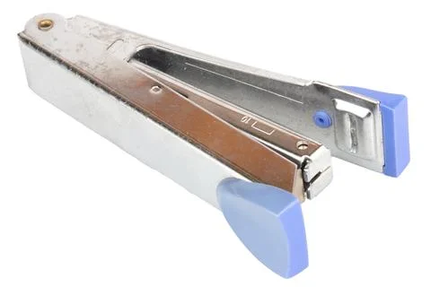 Dirty old stapler on white background Stock Photos