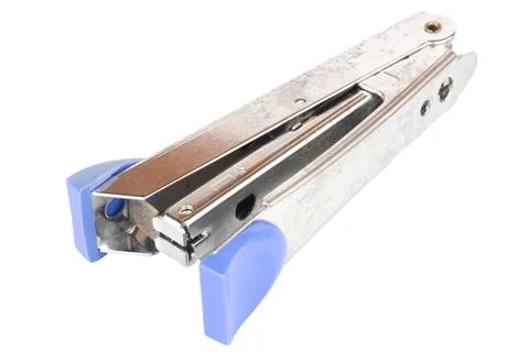 Dirty old stapler on white background Stock Photos